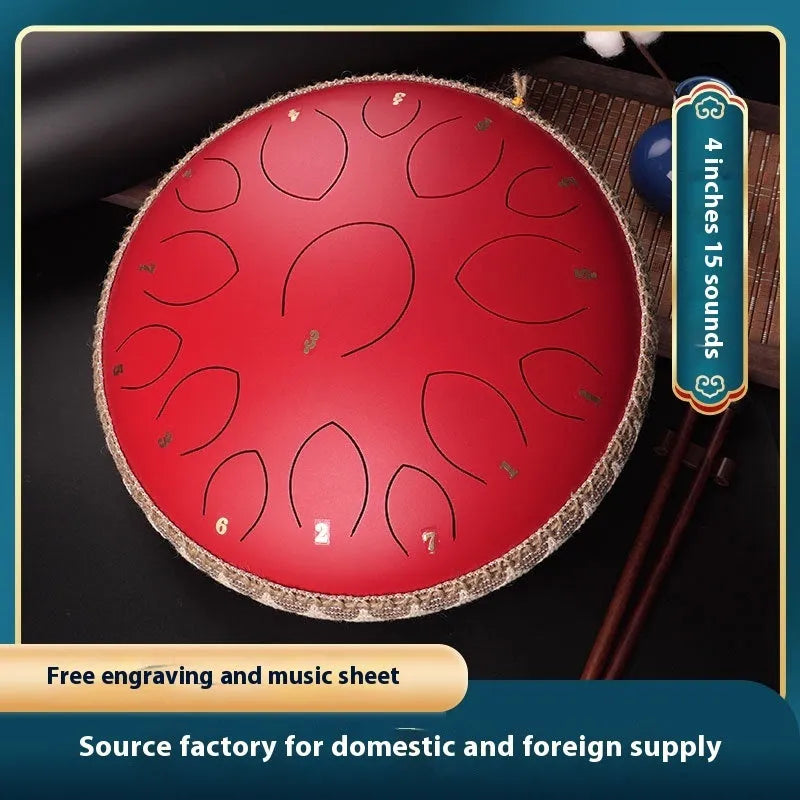 14-inch 15-tone hollow drum percussion instrument in malachite green finish on a wooden surface