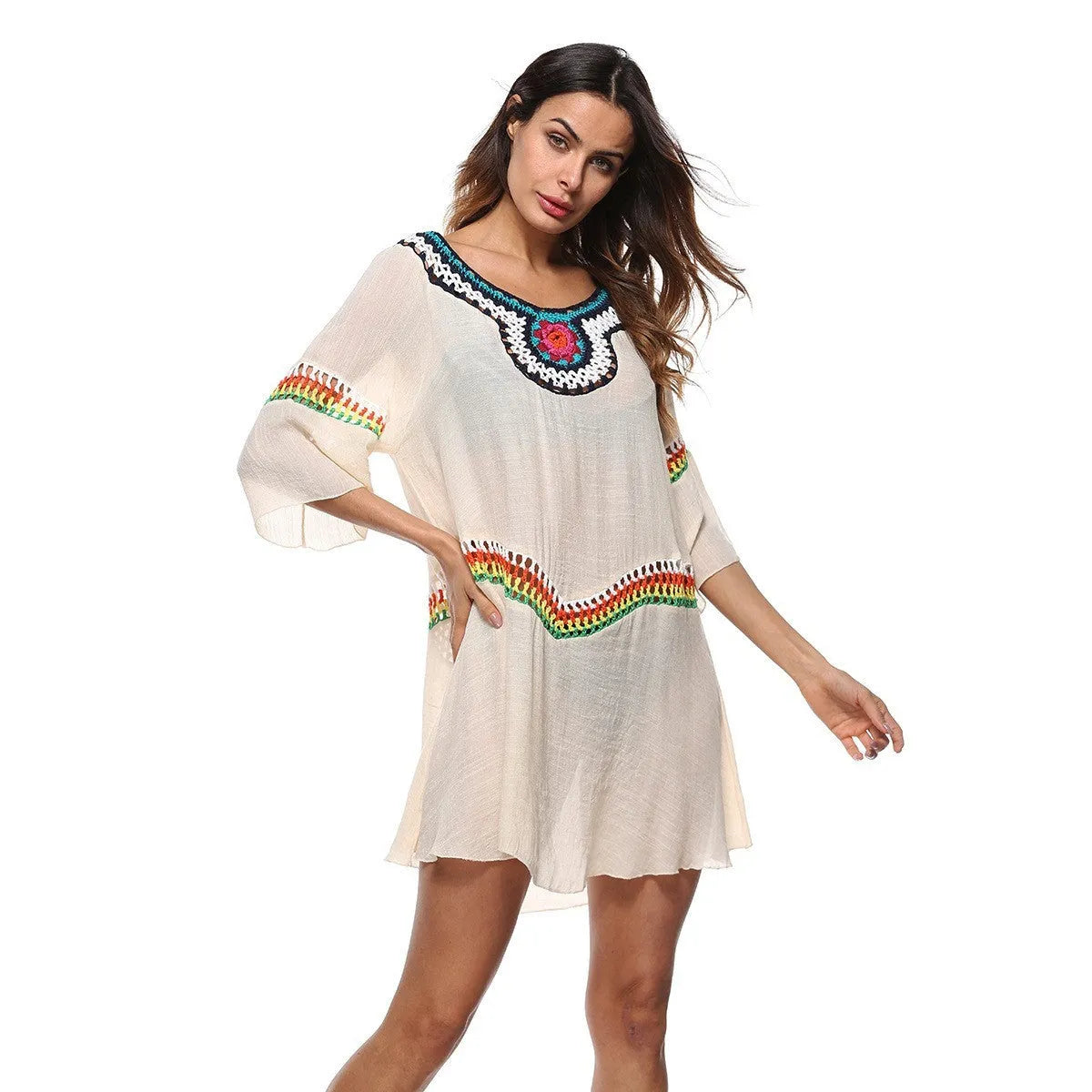 Ethnic style crochet sun protection dress for women in apricot colour, suitable as a beach cover-up.