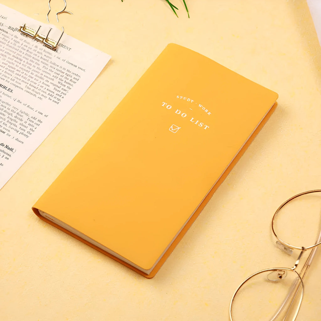 Simple style portable notebook with PU cover in blue, green, pink, or yellow, showing 96 inner pages.