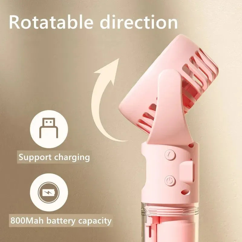 Handheld portable mist fan showing transparent water tank and multiple colour options