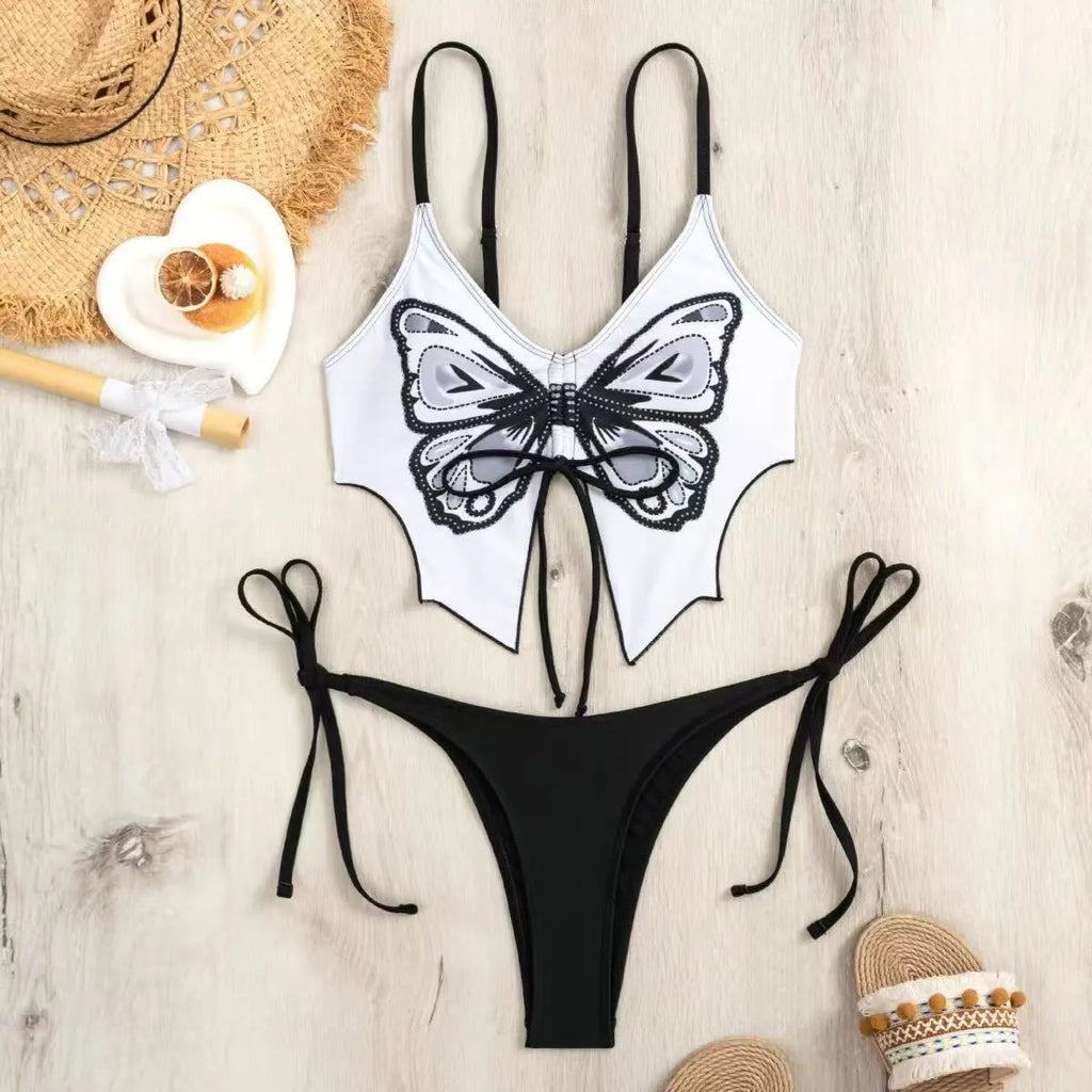 Women's purple bikini set with bow detail and high-leg side split design on briefs