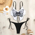 Women's purple bikini set with bow detail and high-leg side split design on briefs