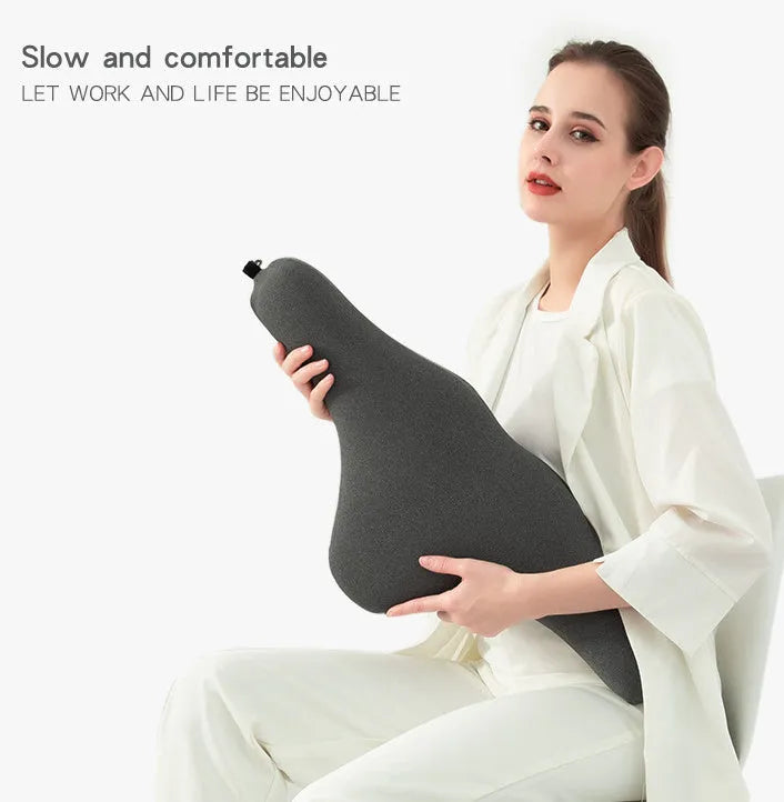Solid-colour car neck memory pillow in dark grey, shown on a car headrest.