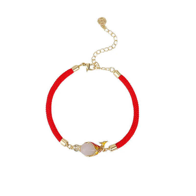 Copper women's necklace with lucky koi pendant on red rope hand strap