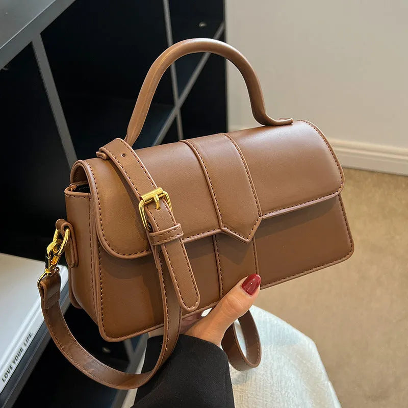 Women's beige PU messenger bag with file organiser, showing horizontal square shape and external pocket