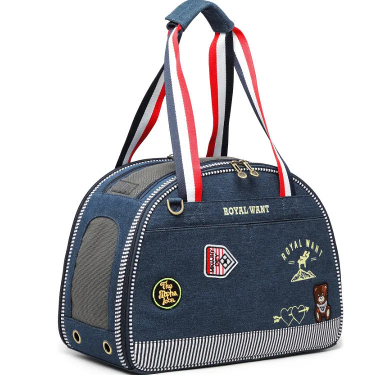 Blue denim pet diaper bag with cartoon pattern, dimensions 43cm by 20cm by 30cm
