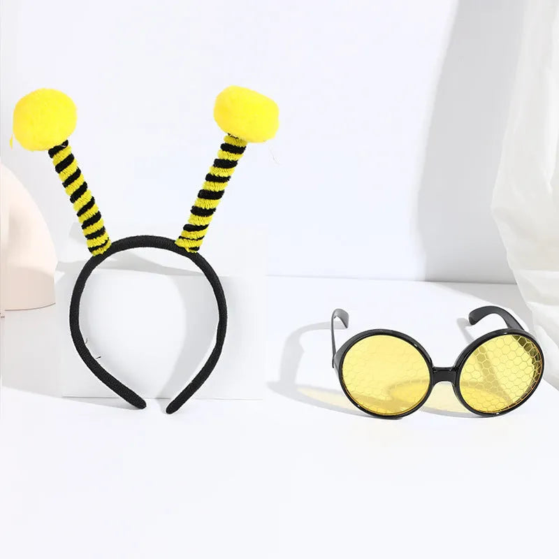 Yellow children's bee costume headband and matching bug-eye glasses for fancy dress parties.