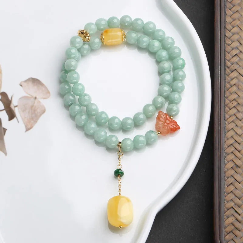 Double-layer jade and beeswax bracelet with hanging barrel beads and retro geometry design