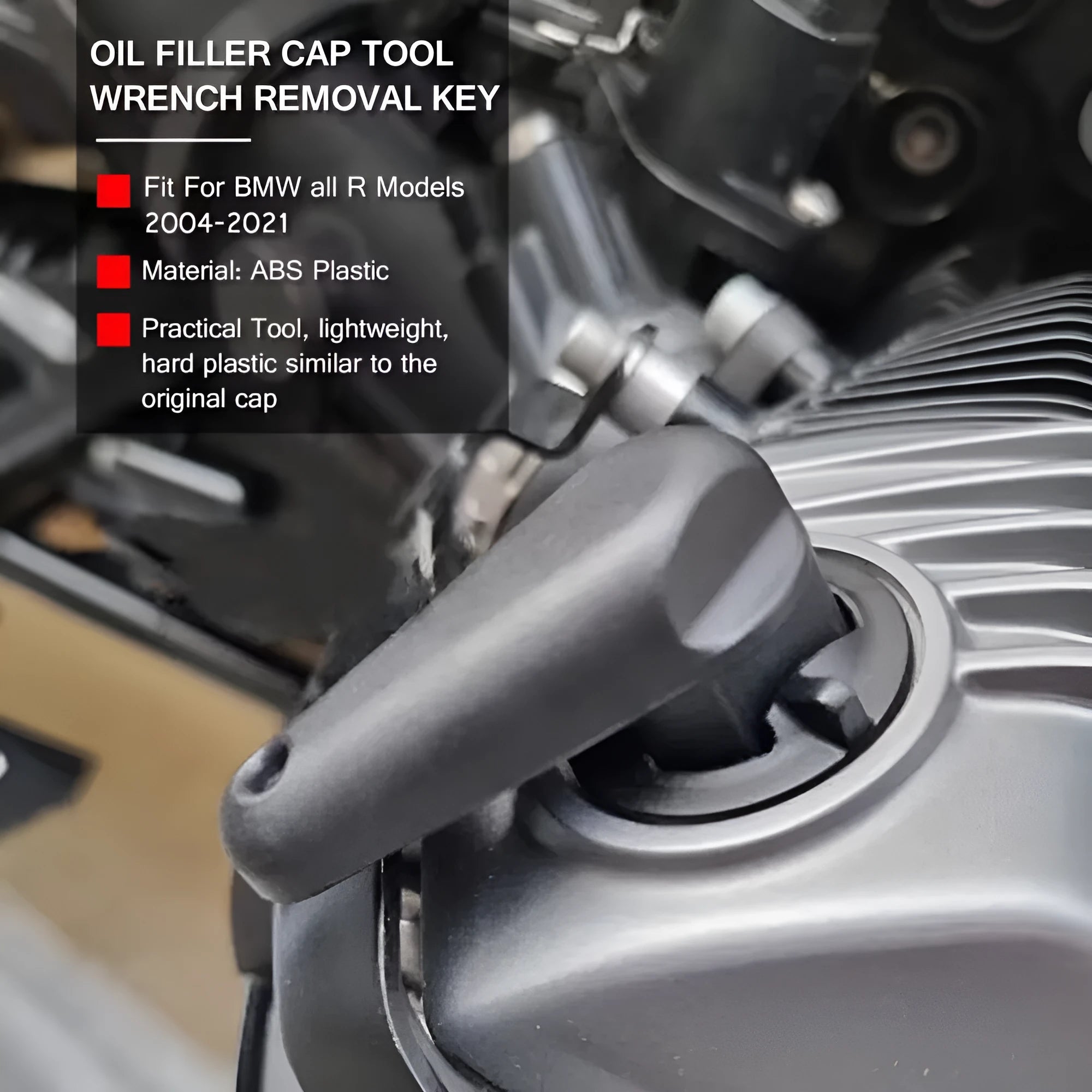 Black nylon quick release wrench for BMW motorcycle engine oil cap on a plain background