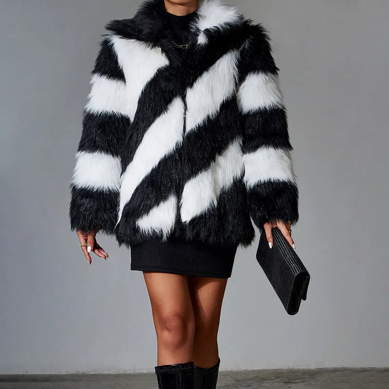 Women's faux fur coat with contrast lapel and detachable fur collar on a hanger.