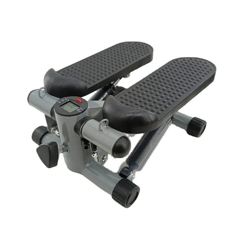 Silver grey household hydraulic pedal exercise machine for waist slimming and cardio.