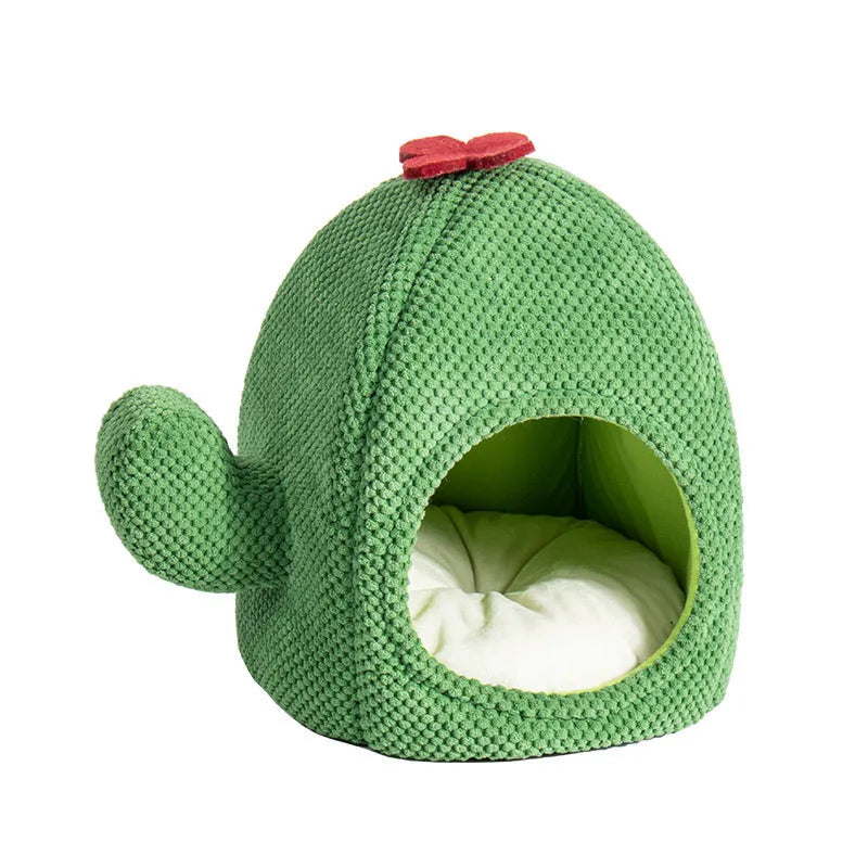 Green cactus-shaped enclosed cat bed tent with a plush cushion inside for kittens or small dogs.