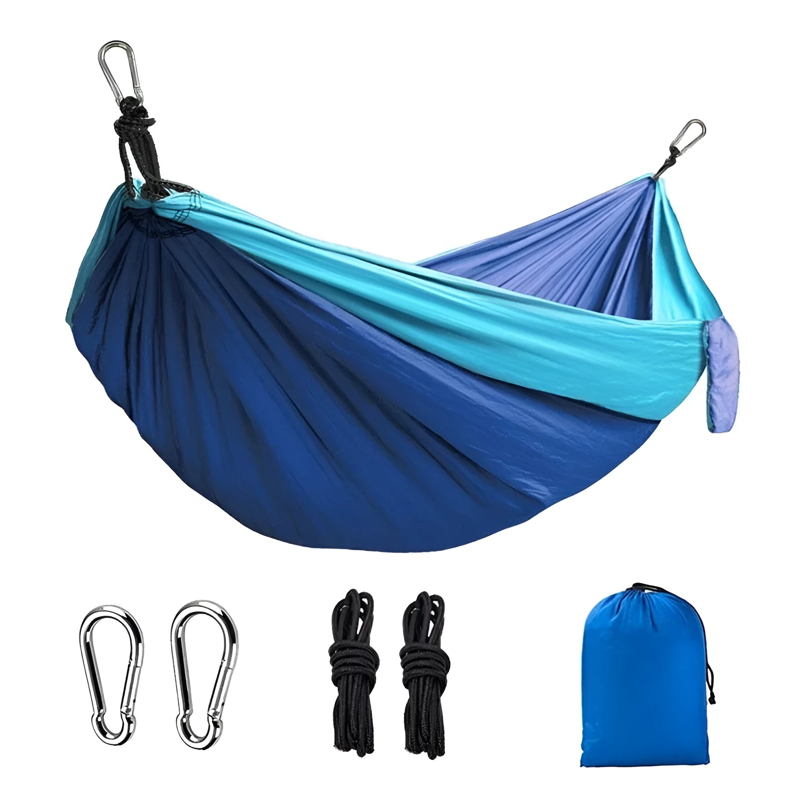 A sapphire blue parachute nylon hammock hung between two trees in a woodland setting.