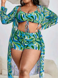 Women's floral print swimsuit three-piece set showing bra, shorts, and matching cardigan
