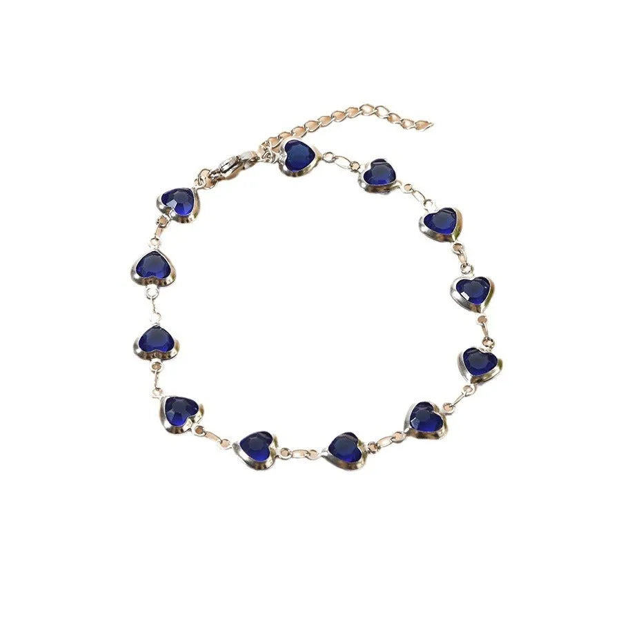 Geometric stainless steel bracelet with electroplated colourful finish showing round and oval design elements