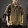 Brown men's half-zip stand collar short sleeve shirt with a fleece-lined interior on a hanger.