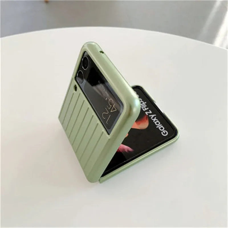 Ultra-thin black PC flip case for a Samsung Z Flip3 folding mobile phone.