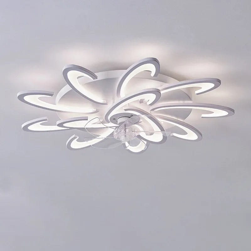 Modern white ceiling fan light with six-blade design and integrated light fitting on a room ceiling.