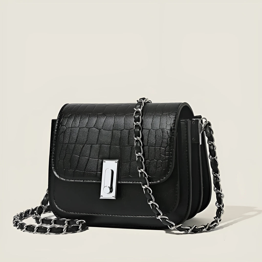 Green soft square women's cross-body shoulder bag with chain strap and external pockets.