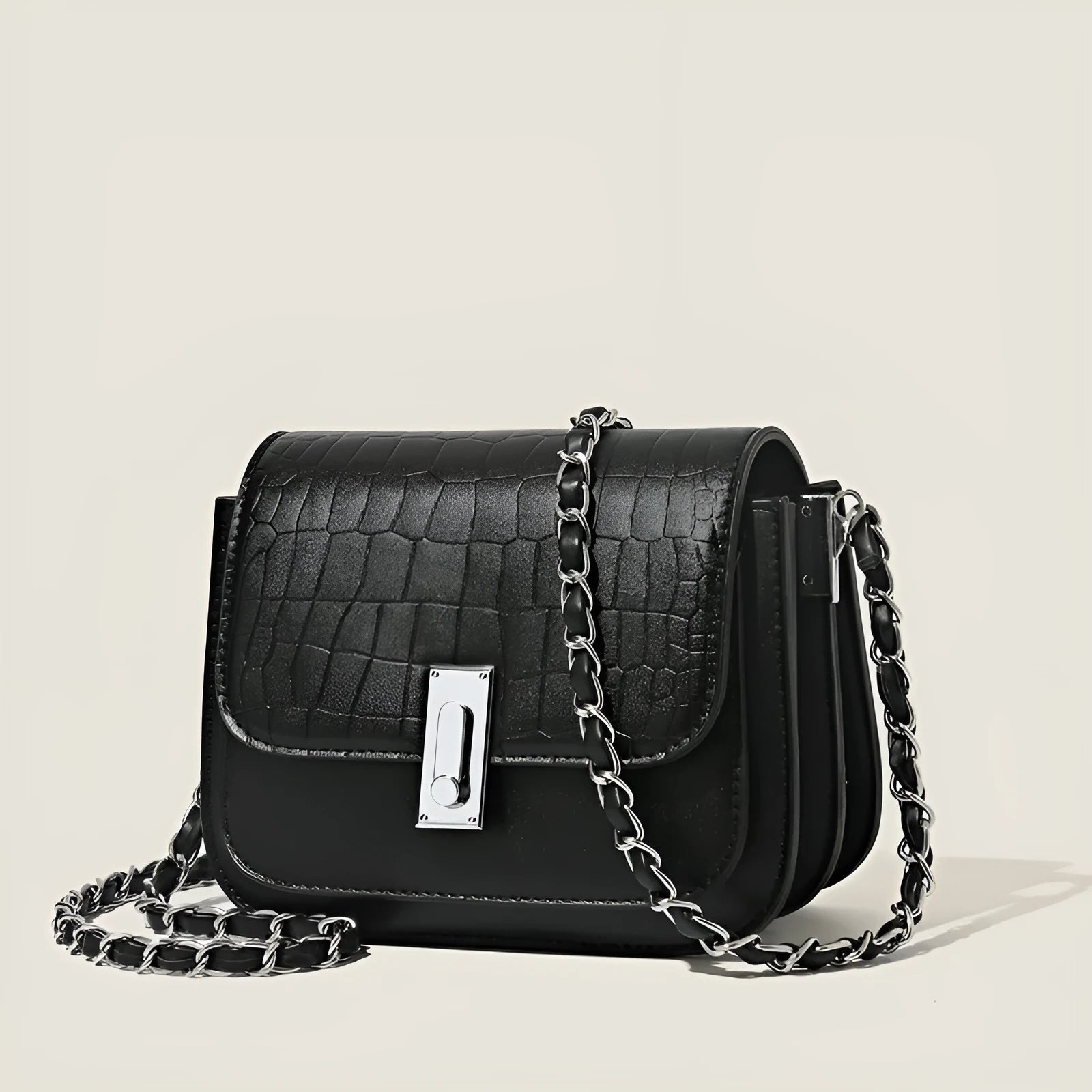 Green soft square women's cross-body shoulder bag with chain strap and external pockets.