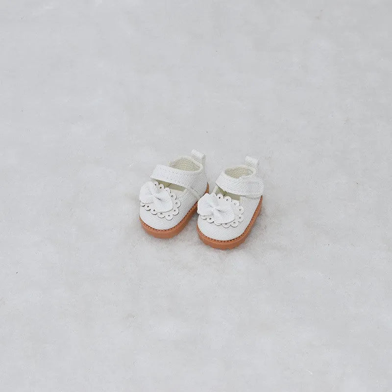 A pair of polyurethane doll shoe accessories for a 17cm figure, shown in a selected style and colour.