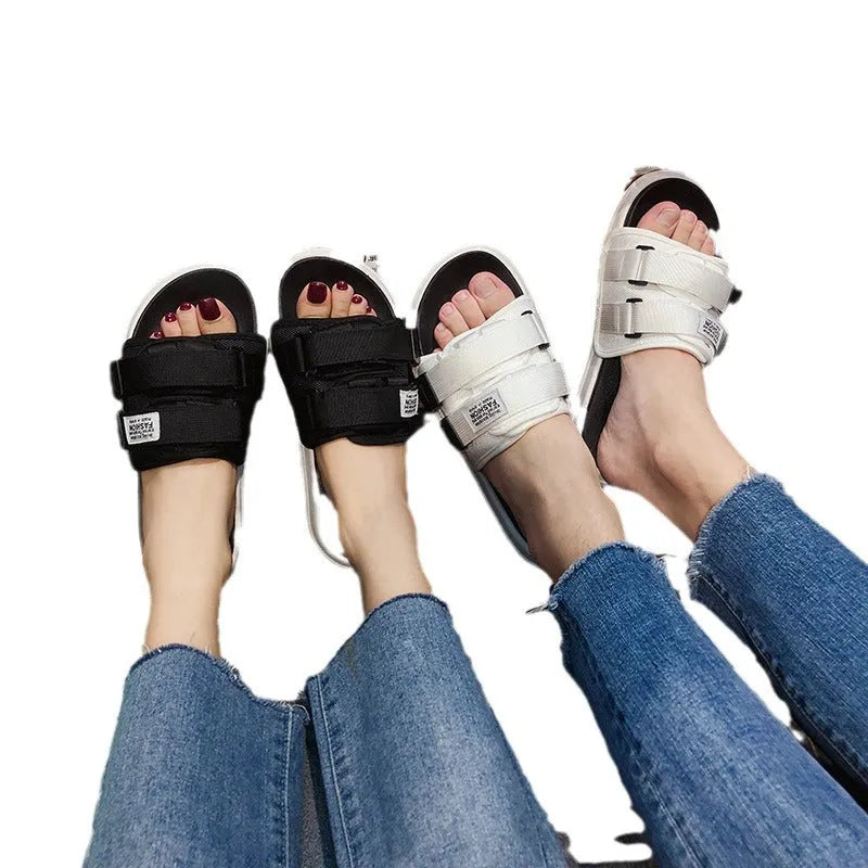 Men's canvas sports sandals with hook-and-loop closure in black and white, available in six sizes from UK 35-36 to 45-46.