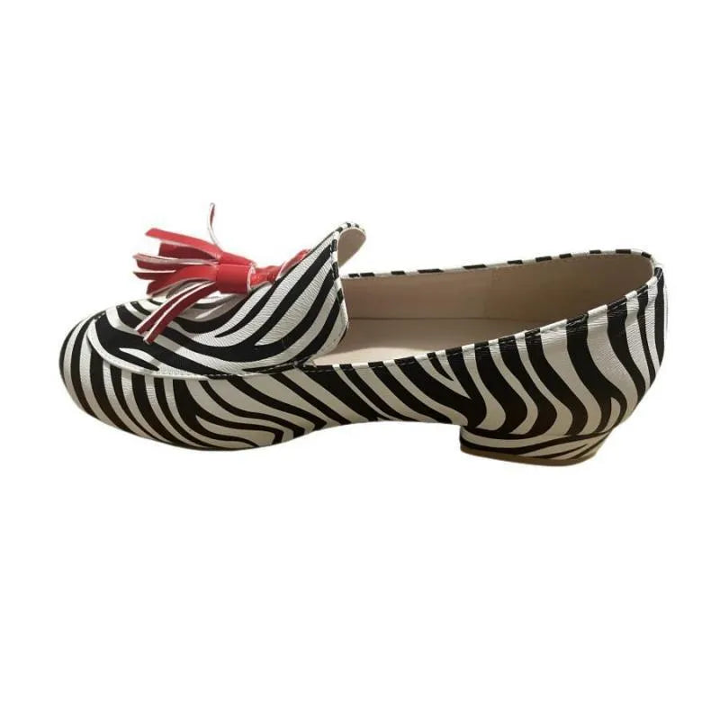 Leopard print flat heel tassel loafers for women with round toe and rubber sole