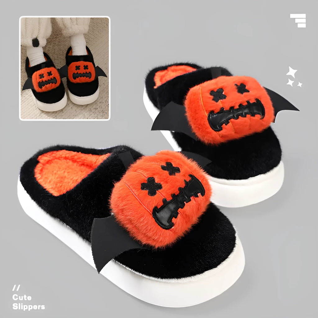 Black Halloween cartoon pumpkin slippers with small wings design on indoor floor