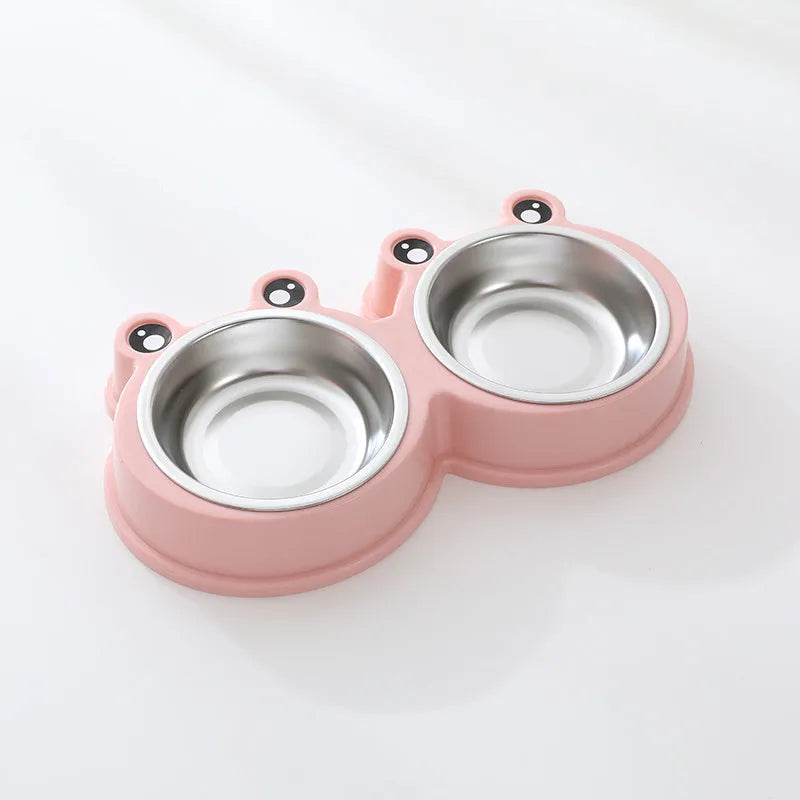 Stainless steel double compartment pet bowl for food and water on a silicone non-slip base.