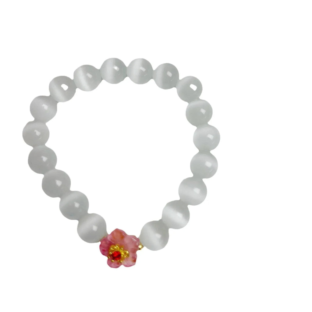 Handmade glass beaded bracelet with floral design in yellow, pink, white or green colour options