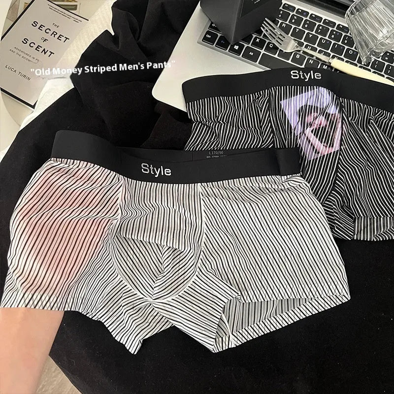 Men's black ice silk nylon boxer briefs with seamless mid waist design