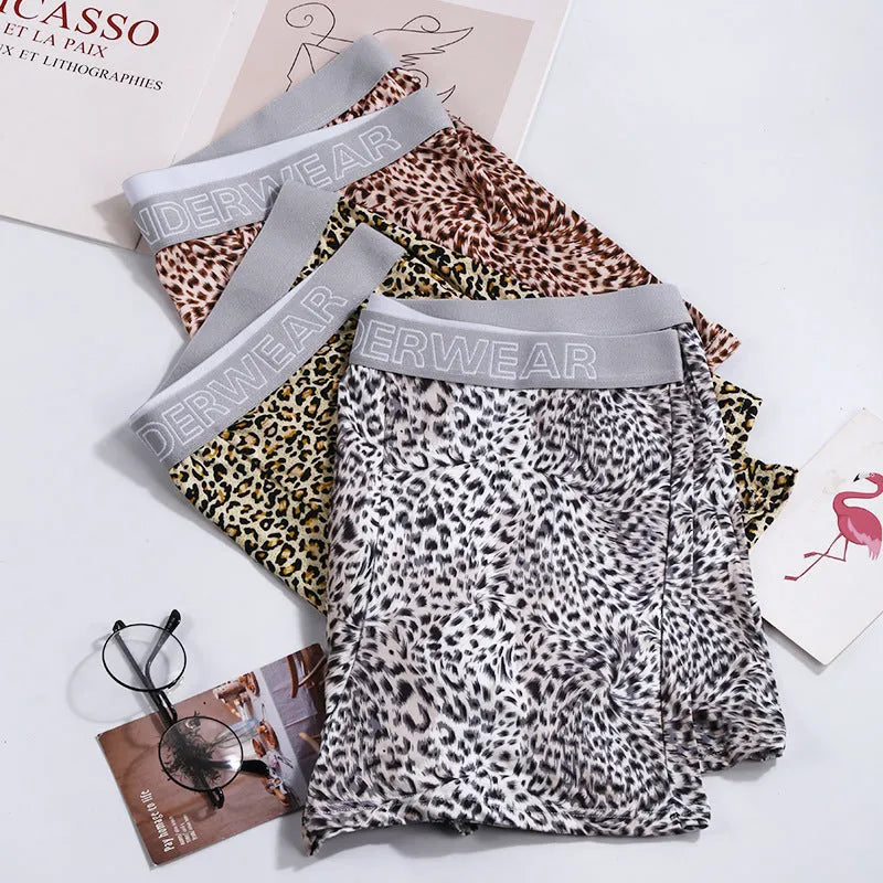Men's loose fit leopard print underwear in milk silk polyester fabric showing mid-waist design