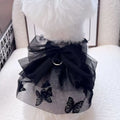 Black layered tulle princess skirt on a small dog, showing chest fit and back length.