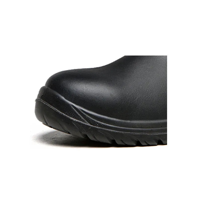 Black high-top leather safety work boots with steel toecap on a grey background.