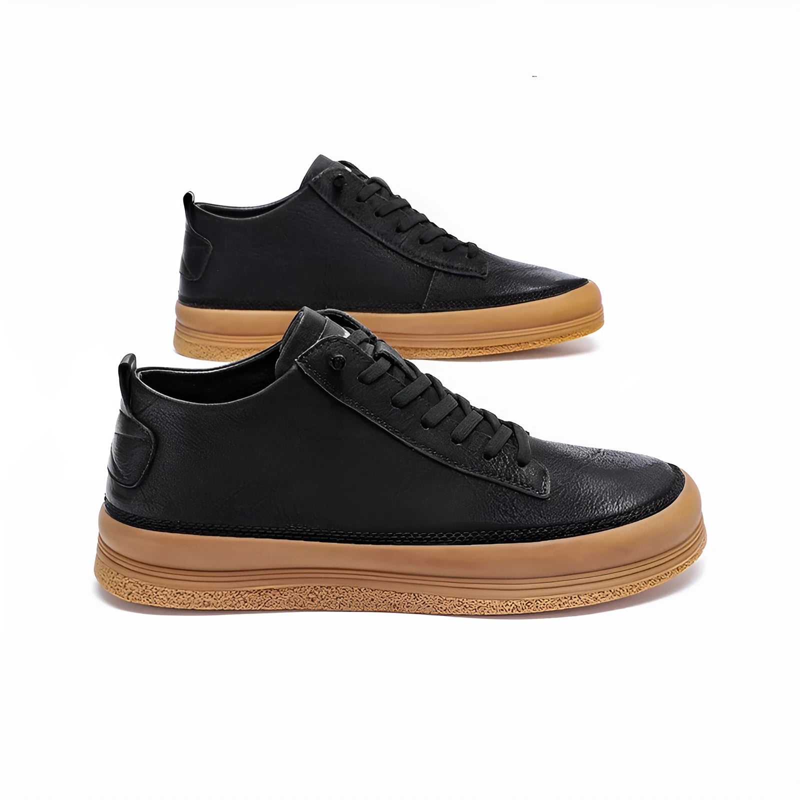 Men's black leather casual trainers with white rubber soles and laces on a white background.