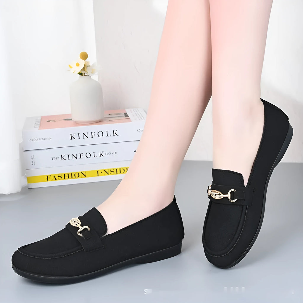 Gommino women's casual slip-on shoes in black with soft rubber sole and round toe