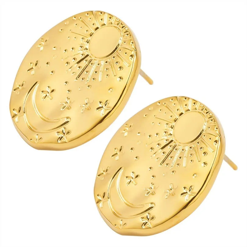 A pair of geometric shell design stud earrings in 304 stainless steel with a gold plated finish.