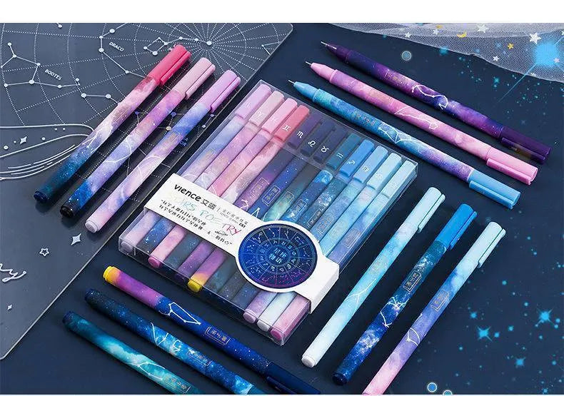 Twelve constellation zodiac ballpoint pens with bright star designs on plastic bodies, assorted colours, set of 12