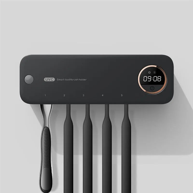 UV toothbrush holder steriliser with LED display attached to wall, showing countdown, black colour