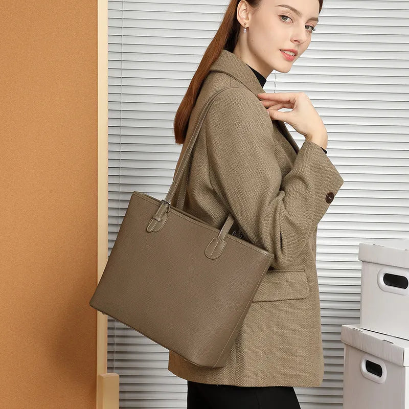 Genuine leather women's tote bag in horizontal square shape showing internal organisers and sandwich pocket