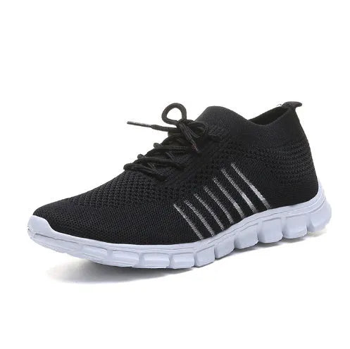 Women's breathable lace-up casual sneakers with flat heel and rubber sole in multiple colour options