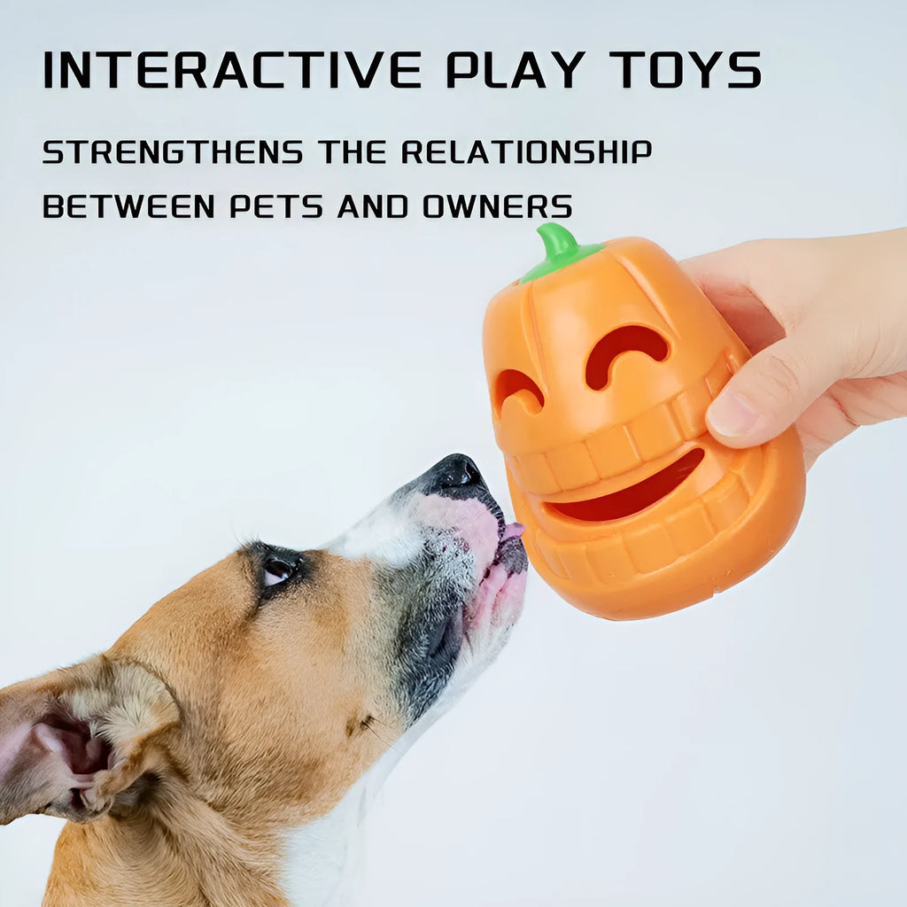 Orange Halloween pumpkin shaped dog chew toy with a black treat-dispensing funnel on top.