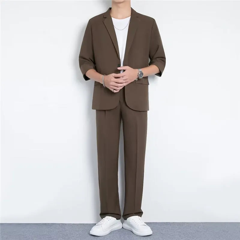 Light business summer suit with half sleeve jacket and trousers in thin cotton fabric