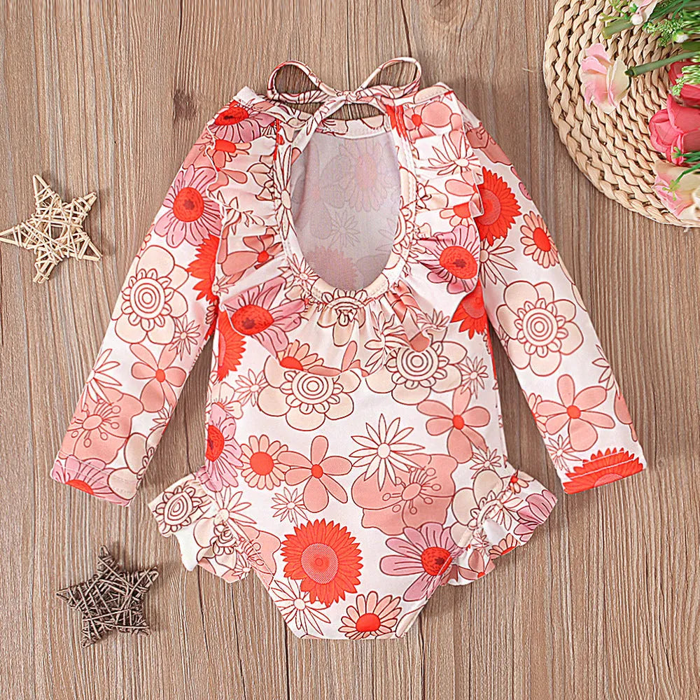 Girl's white floral print open back swimsuit with crew neck design and high-cut briefs