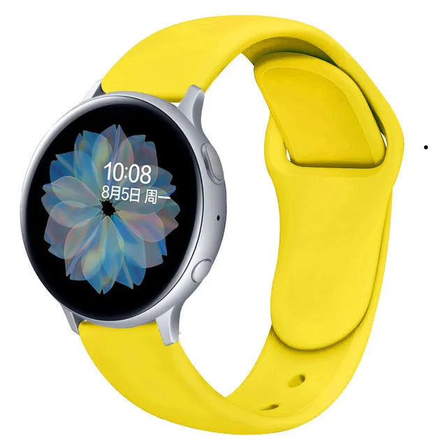 Samsung Galaxy Active 2 watch with a purple reverse buckle silicone strap on a wrist.