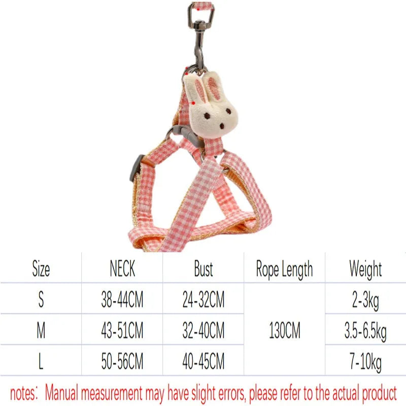 Blue nylon harness and leash set for a small dog, showing quick-release buckles.