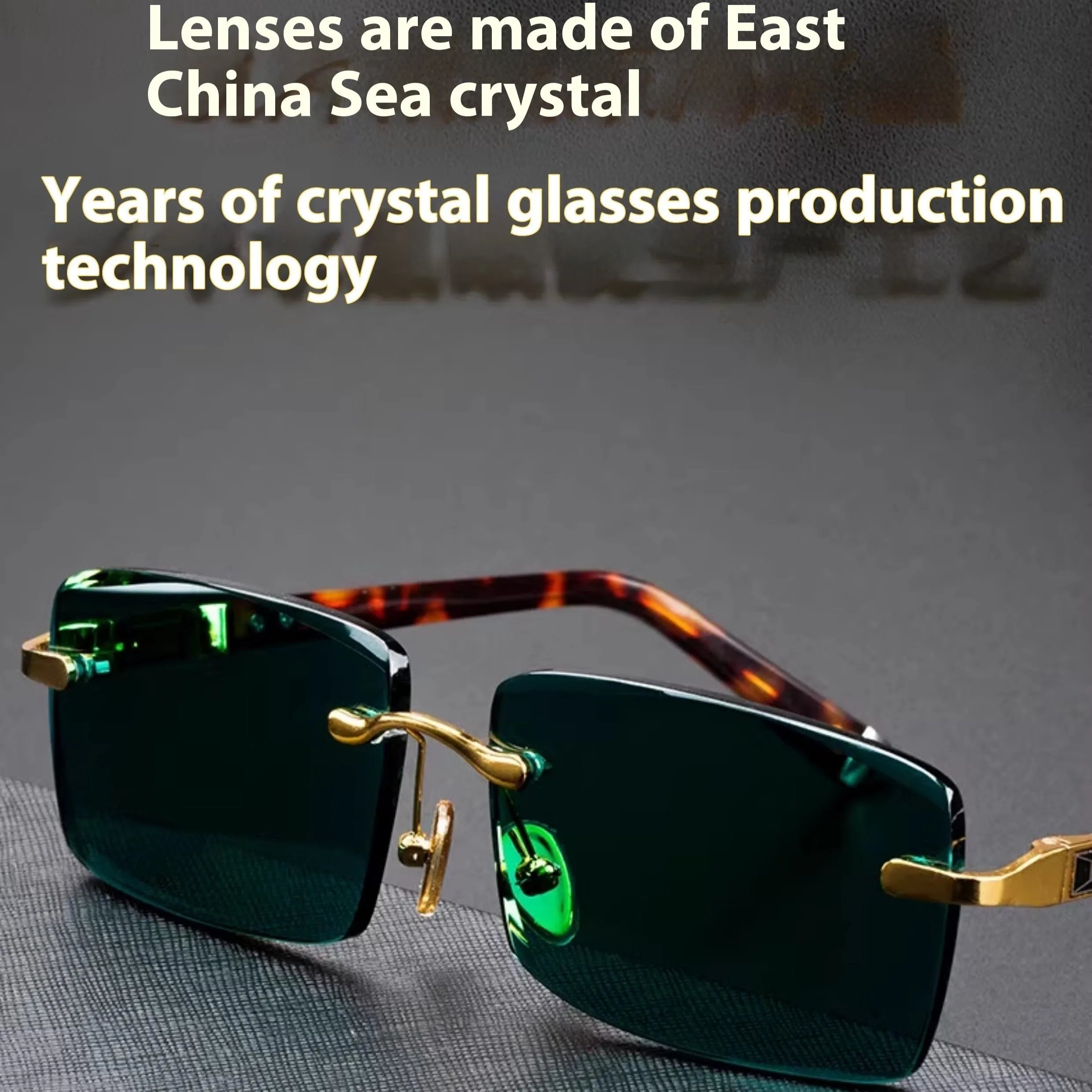 Frameless dark green crystal sunglasses with a minimalist design on a case, showcasing the tinted single-lens construction.