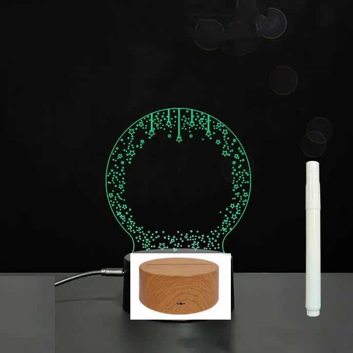 3D acrylic LED message board with touch control, black ABS base, USB cable, and stylus pen on desk