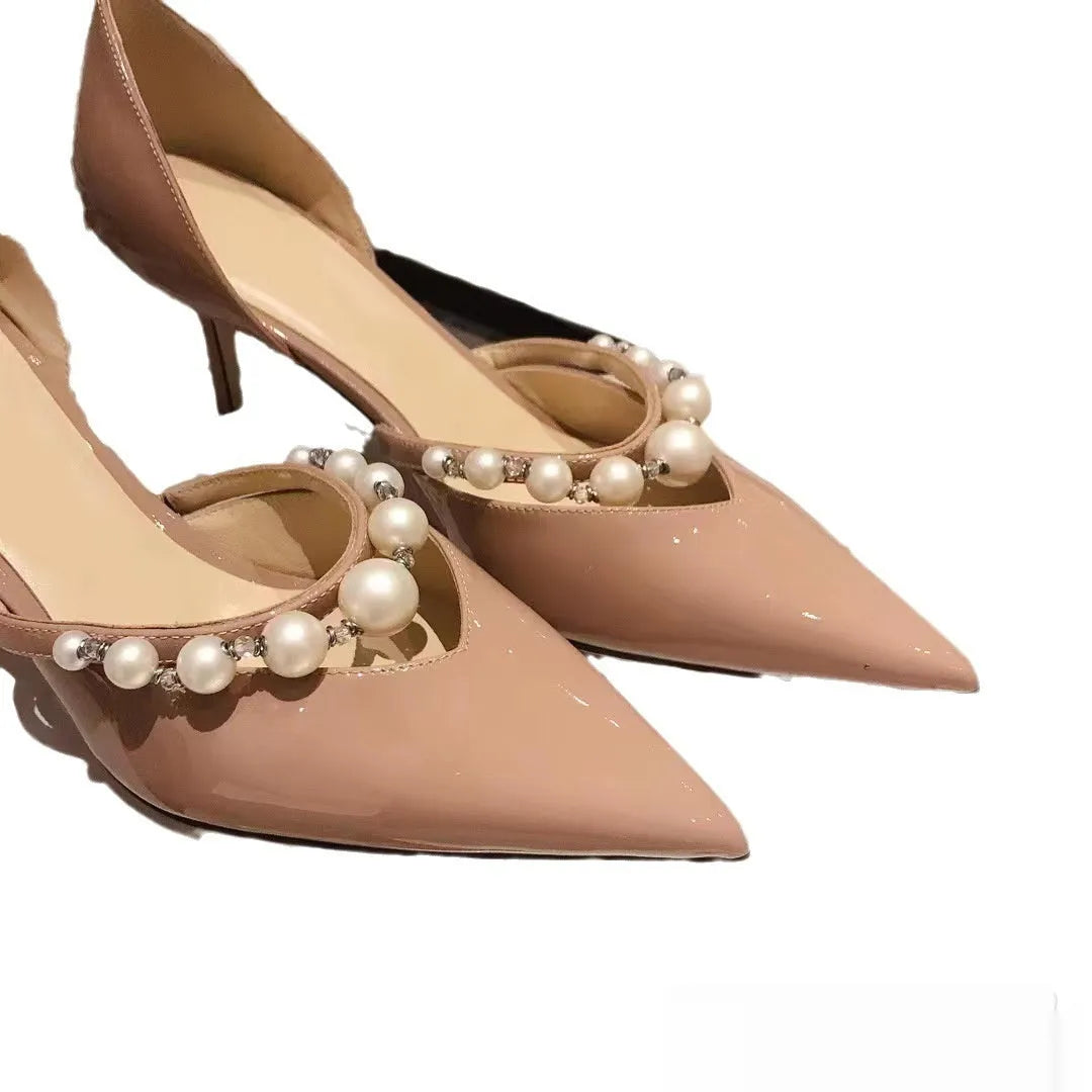 Women's pointed patent leather high heels with stiletto heel and pearl decoration