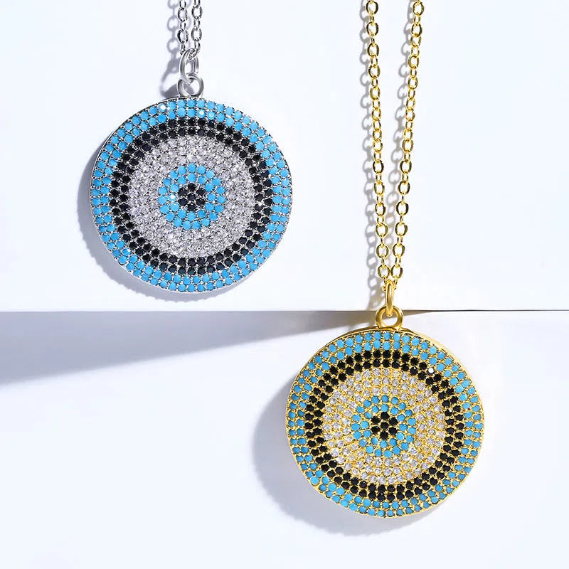 18K gold plated copper clavicle chain necklace with zircon pendant on display, gold finish, snake bone chain
